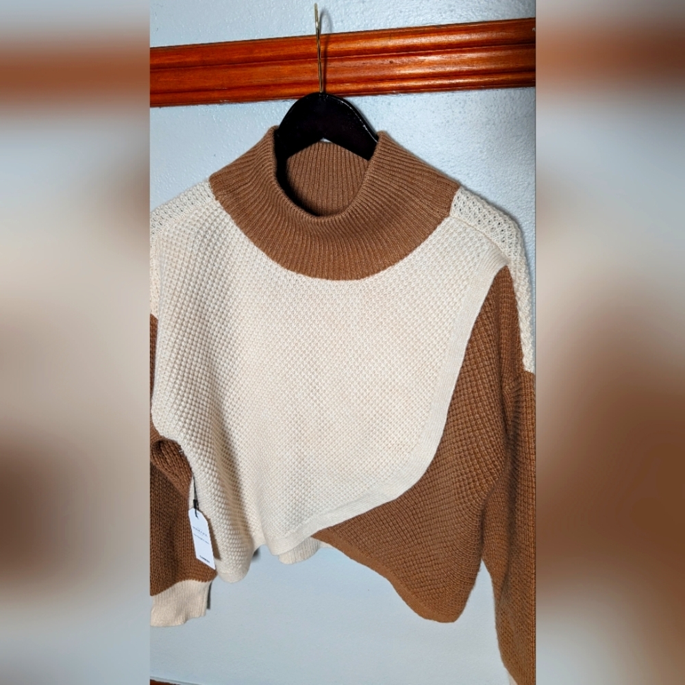 Sweater designer reversible design